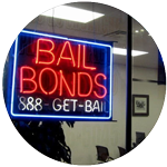 Bail bonds neon sign with blue border, red lettering